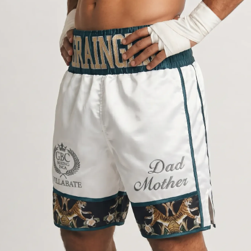 Attack BX custom boxing shorts template with side and lower panels, contrasting trims.